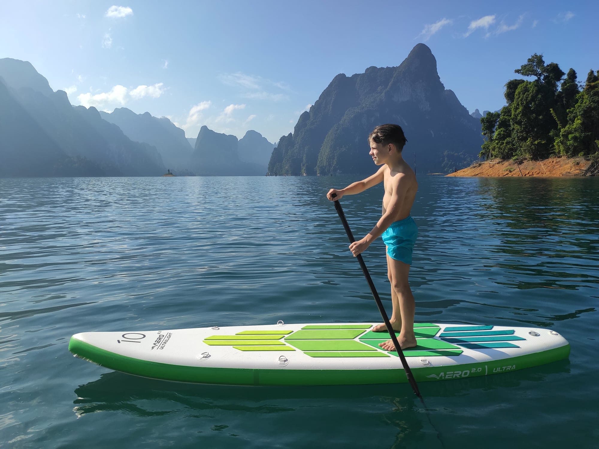 Paddler on an Aero Surf inflatable SUP board